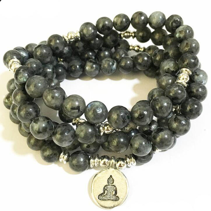 Bracelet en pierre noire avec pendentif Bouddha