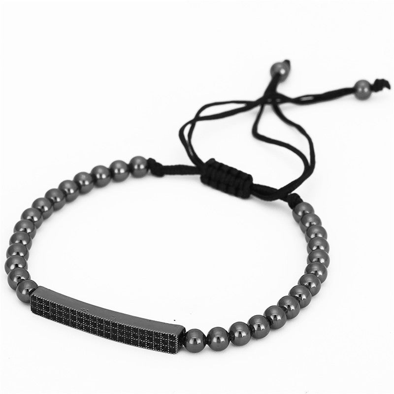 Bracelet en perles grises avec fermoir ajustable