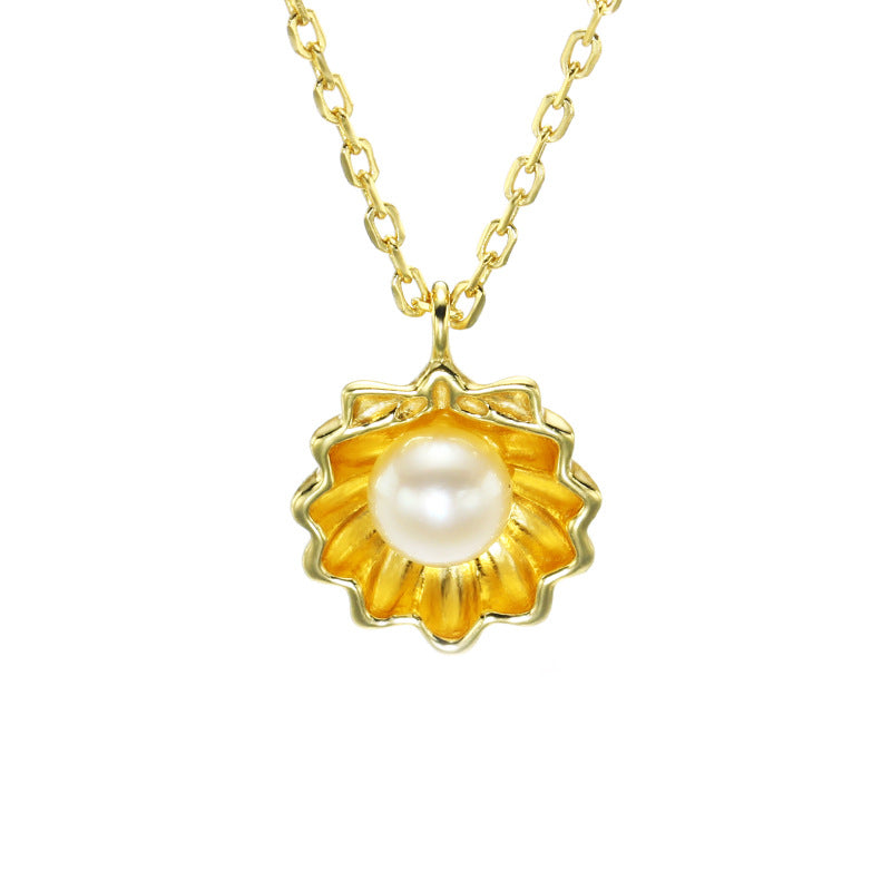 Collier perle coquillage, vue de face, élégance