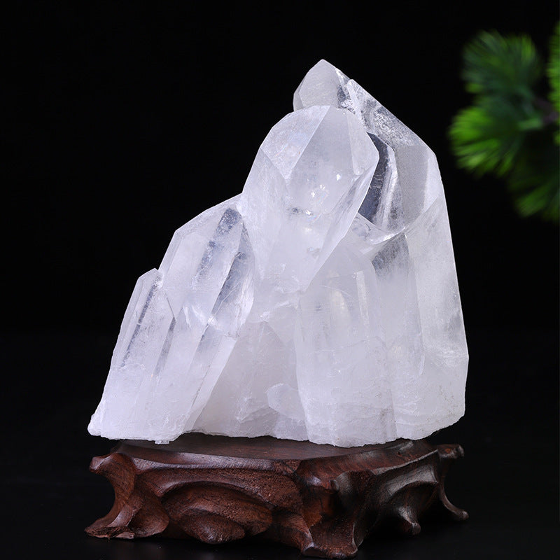 Grand cristal blanc naturel sur support en bois