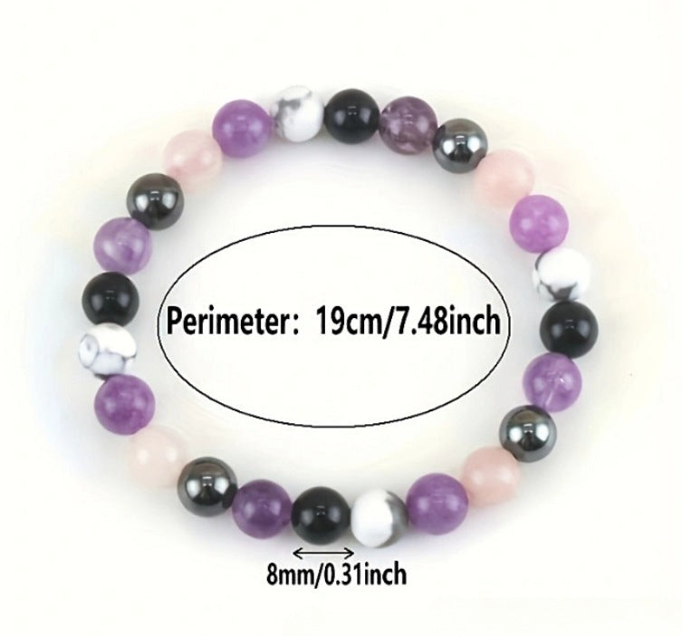 Bracelet en pierres violettes et blanches, 19 cm.