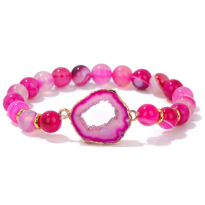 Bracelet en perles d'agate rose avec pierre centrale géométrique