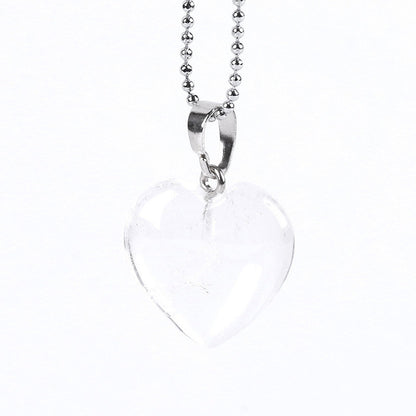 Collier avec pendentif cœur en pierre transparente