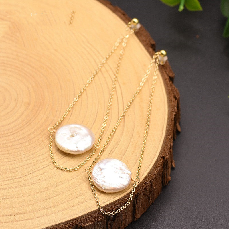 Sublimez votre Style avec notre Boucle d'Oreille en Perle d'Eau Douce Naturelle Blanche ! ✨
