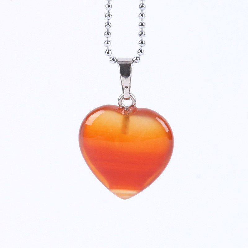 Collier avec pendentif cœur en pierre orange