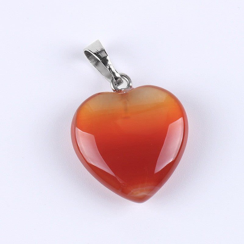 Pendentif cœur en pierre orange naturelle