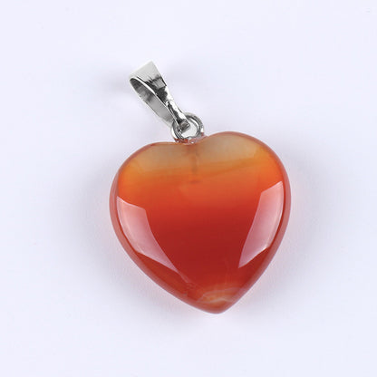 Pendentif cœur en pierre orange naturelle