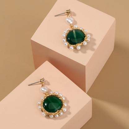 Handgeflochtene Ohrringe aus Kupferdraht mit Naturstein – ein Juwel handwerklicher Eleganz