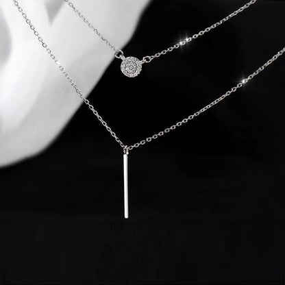 Zoom sur le collier double chaîne argent S925 avec zircon