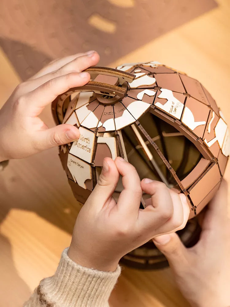 Construction du puzzle 3D globe terrestre en bois